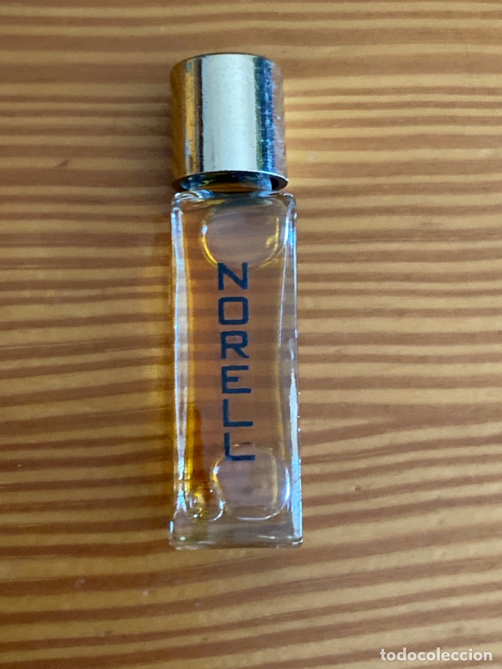Miniaturas de perfumes antigos: Botella Eau de Cologne Norell