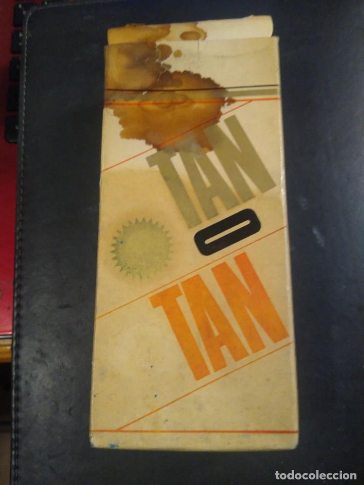 Miniaturas de perfumes antigos: Bronceador marca Tan Tan