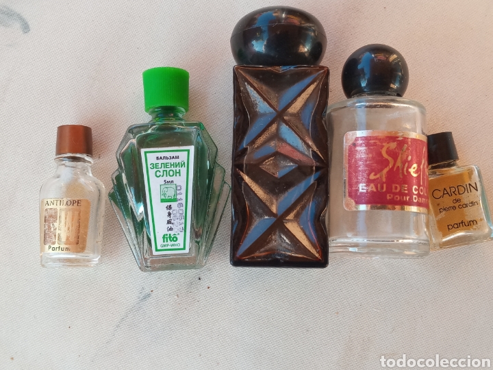 Miniatures of antique perfumes: **LOTE DE BOTELLITAS DE PERFUMES (RARAS) LA MAS GRANDE 7 CM!!**