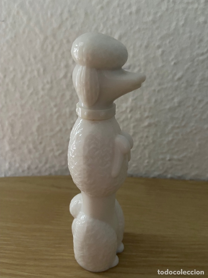 Miniaturas de perfumes antiguos: Colonia Avon perrito caniche - Foto 1