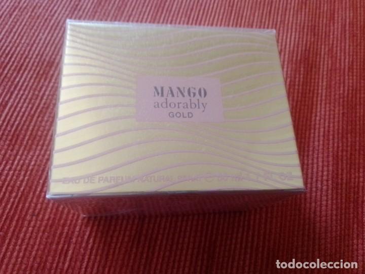 Miniatures of antique perfumes: Mango Adorably Gold Edici&oacute;n limitada Eau de parfum 50 ml . A&ntilde;o 2004 Antonio Puig .