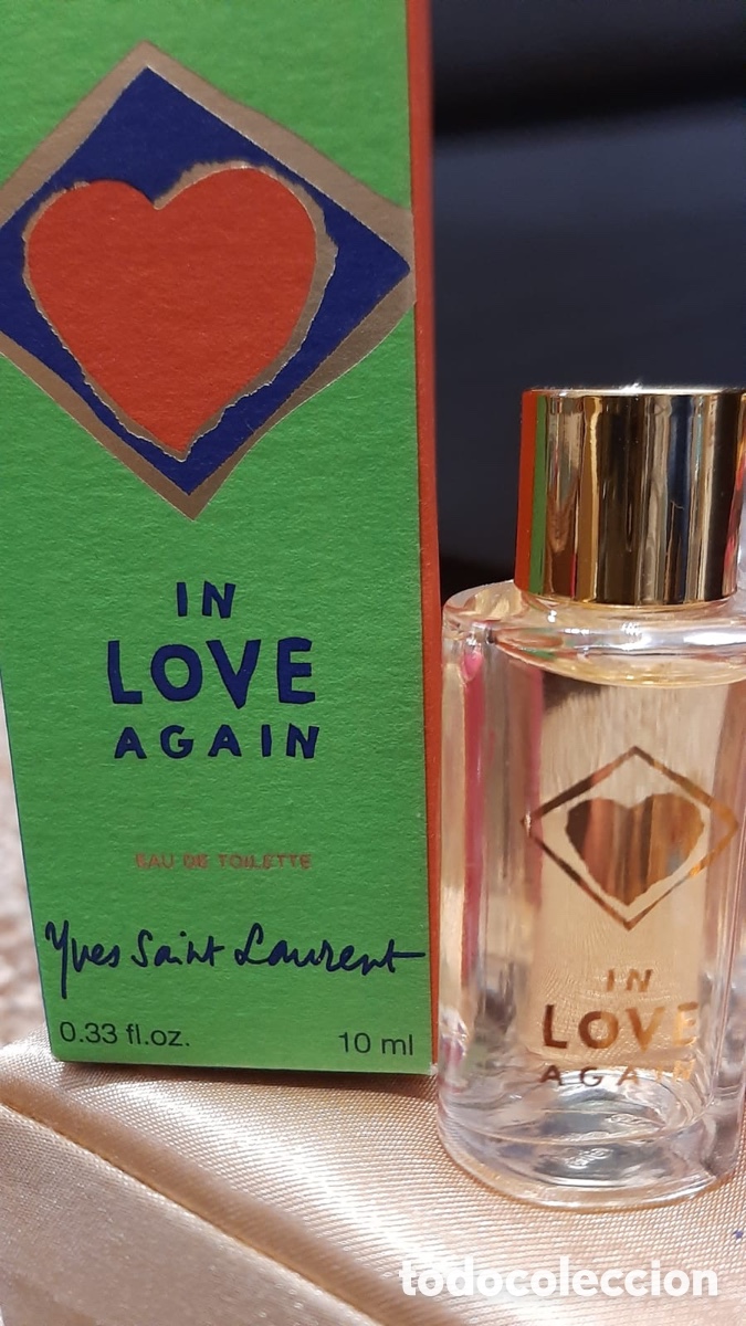Miniaturas de perfumes antiguos: Miniatura In Love Again de Yves Saint Laurent, muy dif&iacute;cil de encontrar.