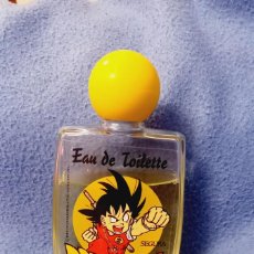 Miniaturas de perfumes antiguos: COLONIA EAU DE TOILETTE DRAGON BALL AÑO 89.. Lote 392388814