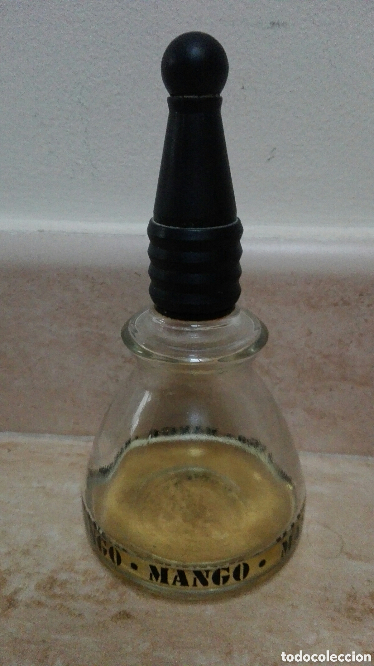 Miniaturas de perfumes antiguos: Frasco de Eau de toilete MANGO 100 ml - Foto 1