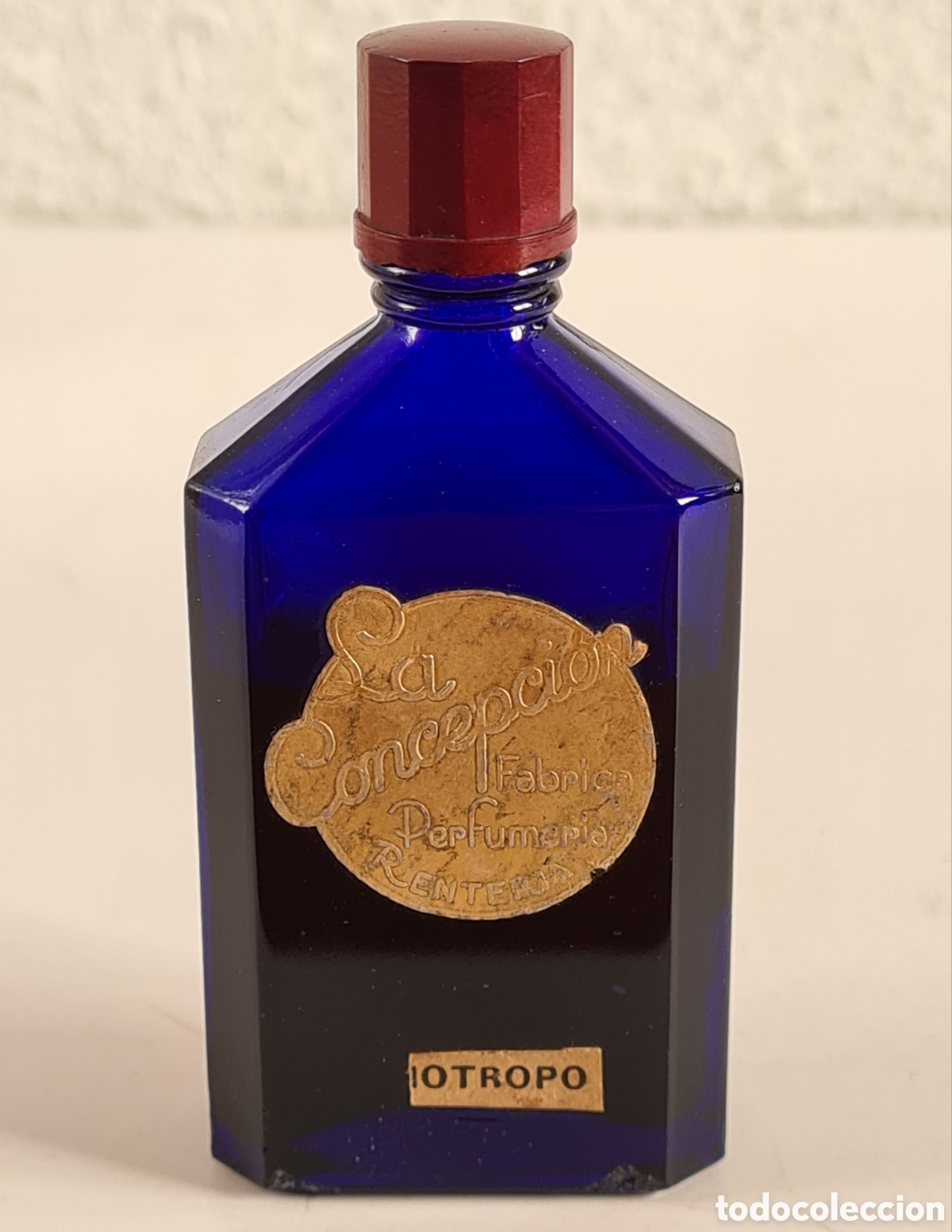 Miniature di profumi antiche: Antiguo Frasco La Concepci&oacute;n F&aacute;brica Perfumer&iacute;a - Renteria - Perfume Cristal Azul Tap&oacute;n Baquelita