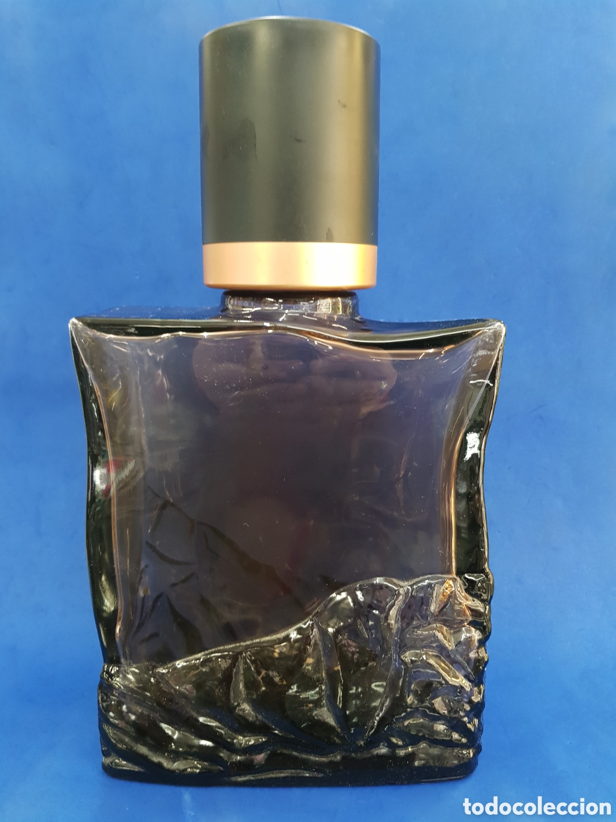 Miniaturas de perfumes antiguos: Boss Elements ficticio Giante escaparate