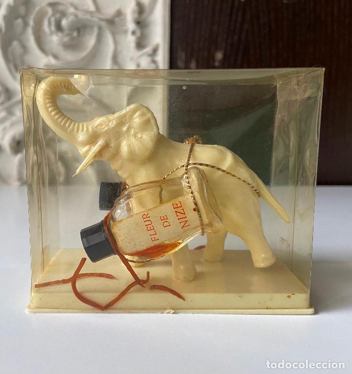 Miniaturas de perfumes antiguos: 191.- Fleur de Nize. Perfume. Original envase, elefante