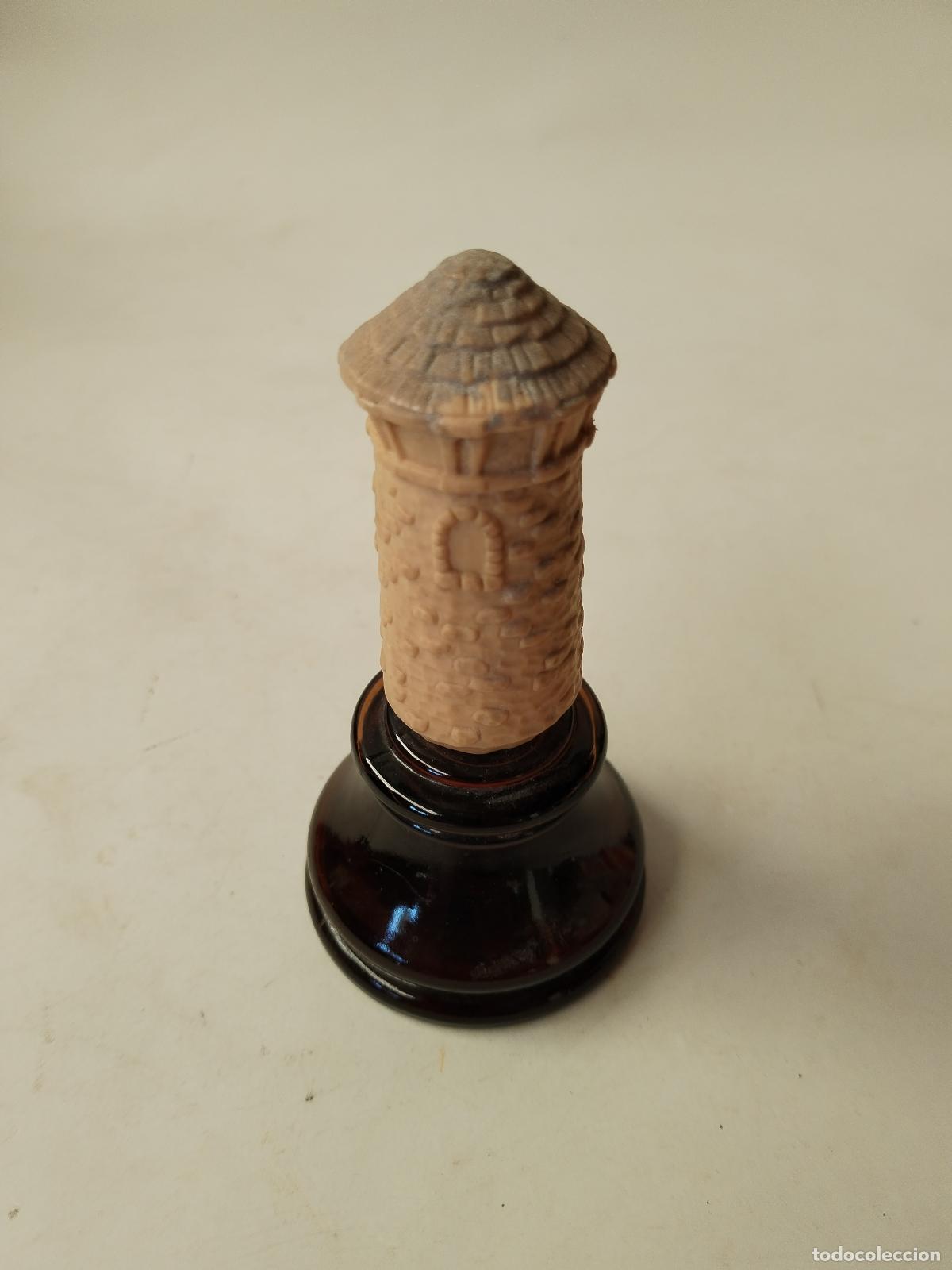Miniaturas de perfumes antiguos: botella avon molino de viento - Foto 2