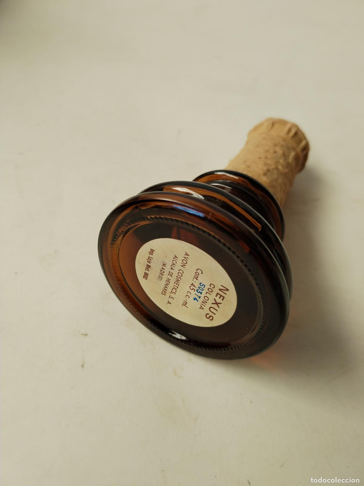 Miniaturas de perfumes antiguos: botella avon molino de viento - Foto 4