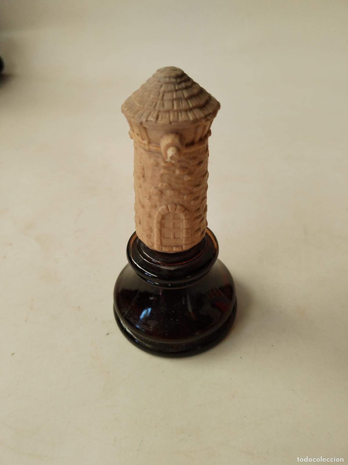 Miniaturas de perfumes antiguos: botella avon molino de viento - Foto 1
