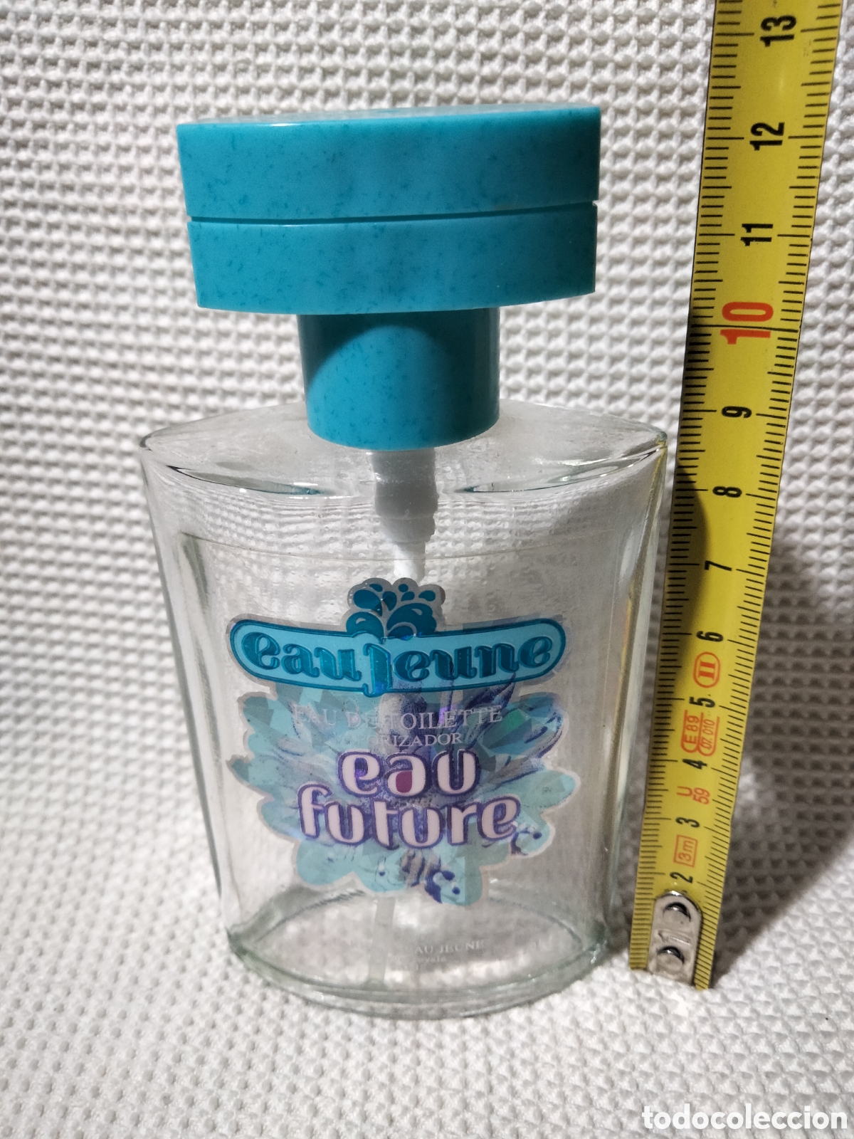 Miniaturas de perfumes antiguos: Botella vac&iacute;a EAU jeune, EAU future - Foto 1