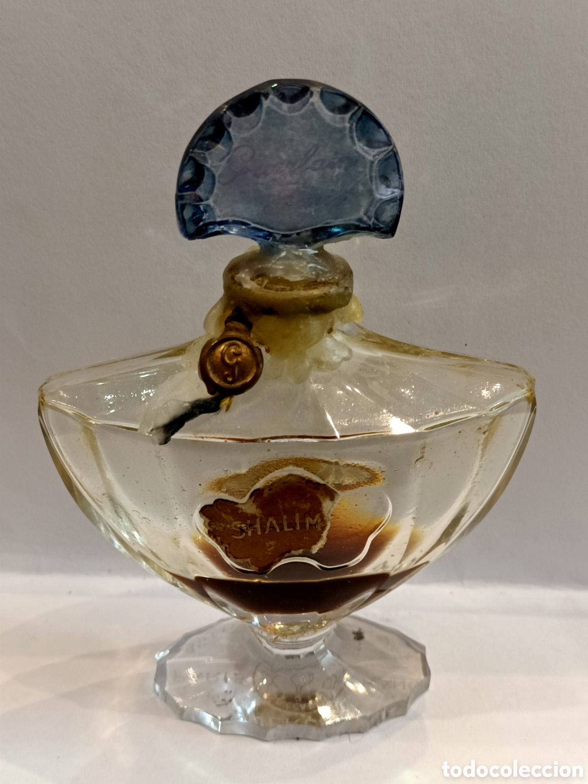 Miniaturas de perfumes antiguos: Frasco de perfume Shalimar de Guerlain Par&iacute;s, de cristal de Baccarat.