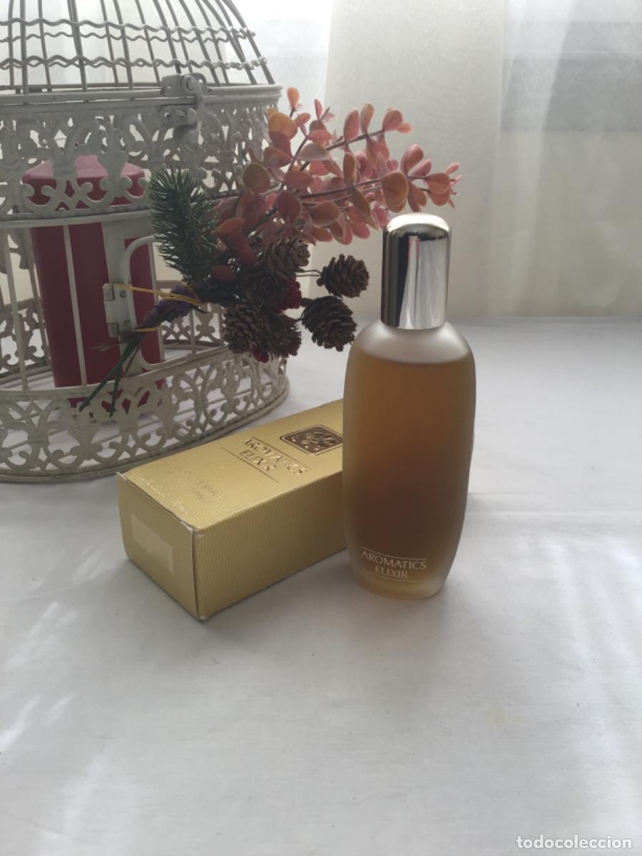 Miniaturas de perfumes antiguos: Aromatics Elixir Eau de parfum Clinique 100 ml - Foto 2