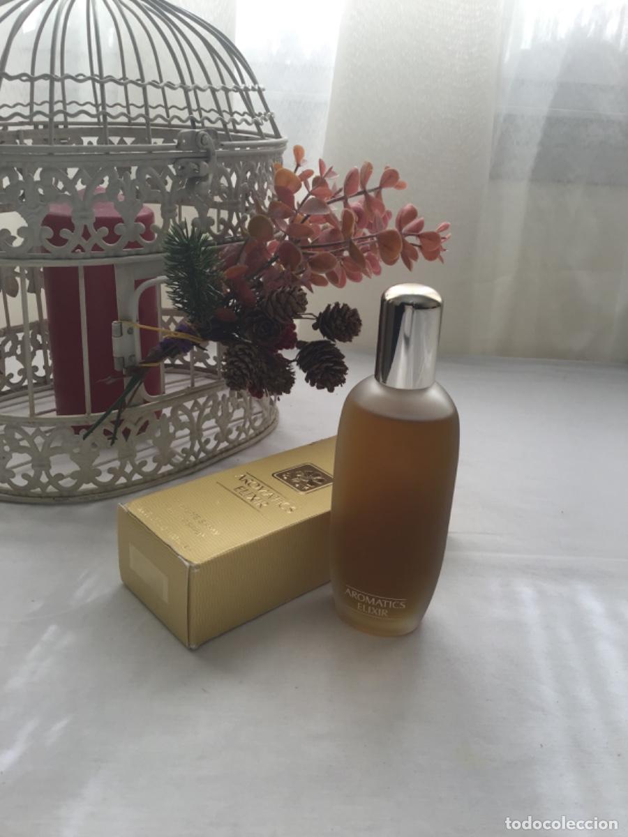 Miniaturas de perfumes antiguos: Aromatics Elixir Eau de parfum Clinique 100 ml - Foto 3