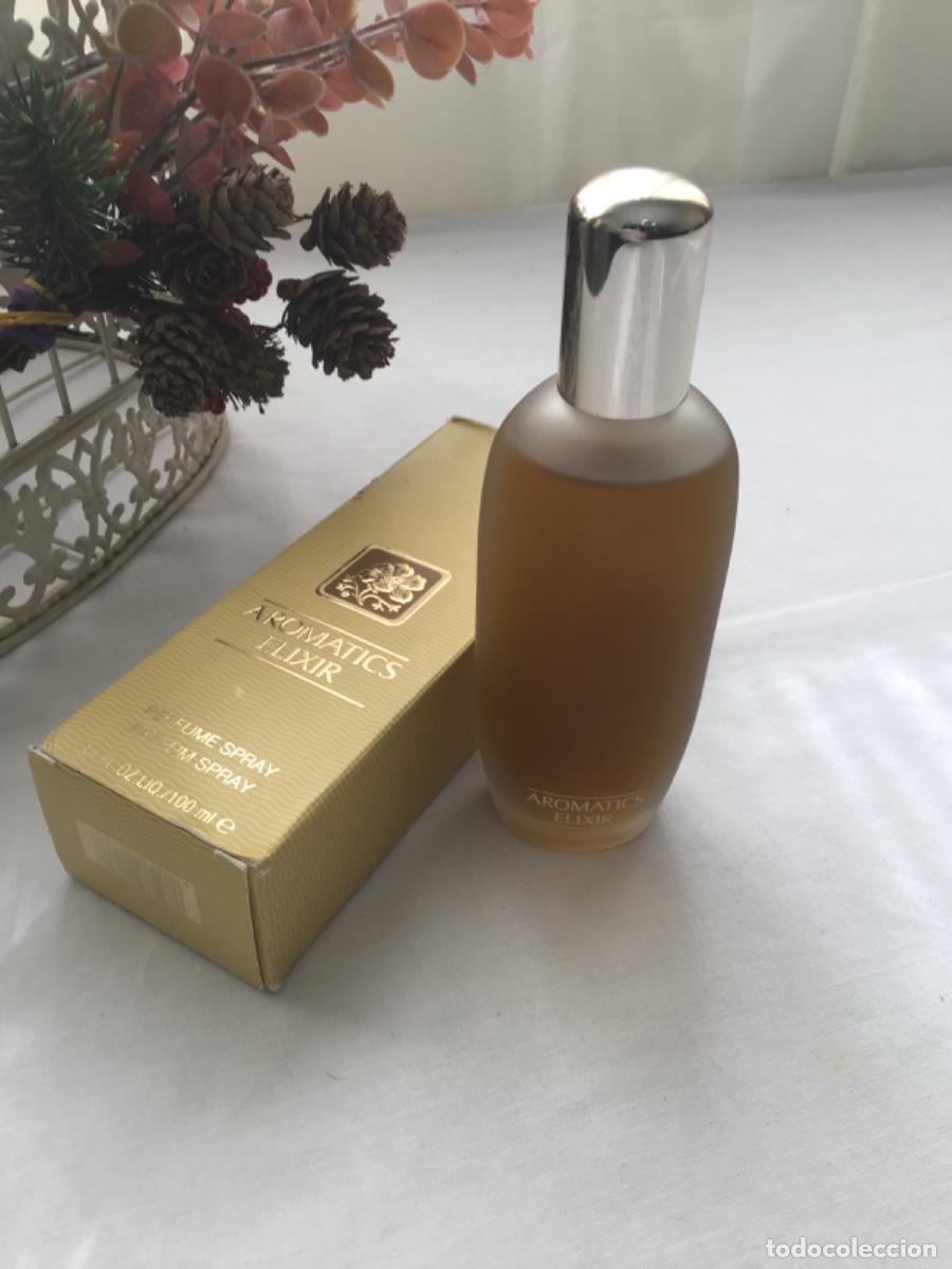 Miniaturas de perfumes antiguos: Aromatics Elixir Eau de parfum Clinique 100 ml - Foto 5
