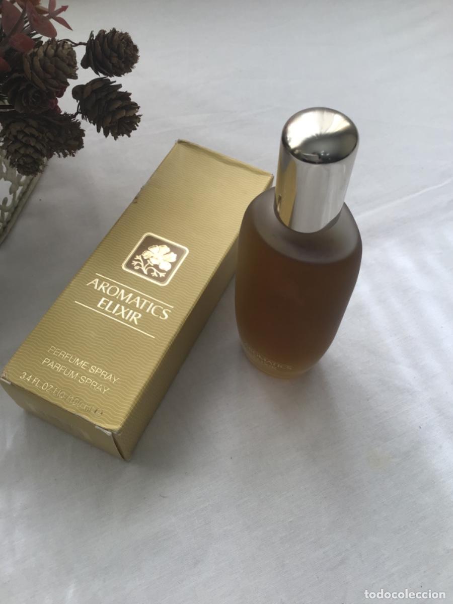 Miniaturas de perfumes antiguos: Aromatics Elixir Eau de parfum Clinique 100 ml - Foto 6