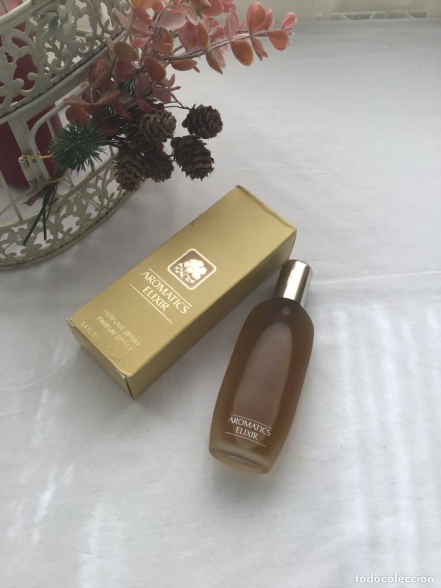 Miniaturas de perfumes antiguos: Aromatics Elixir Eau de parfum Clinique 100 ml - Foto 11