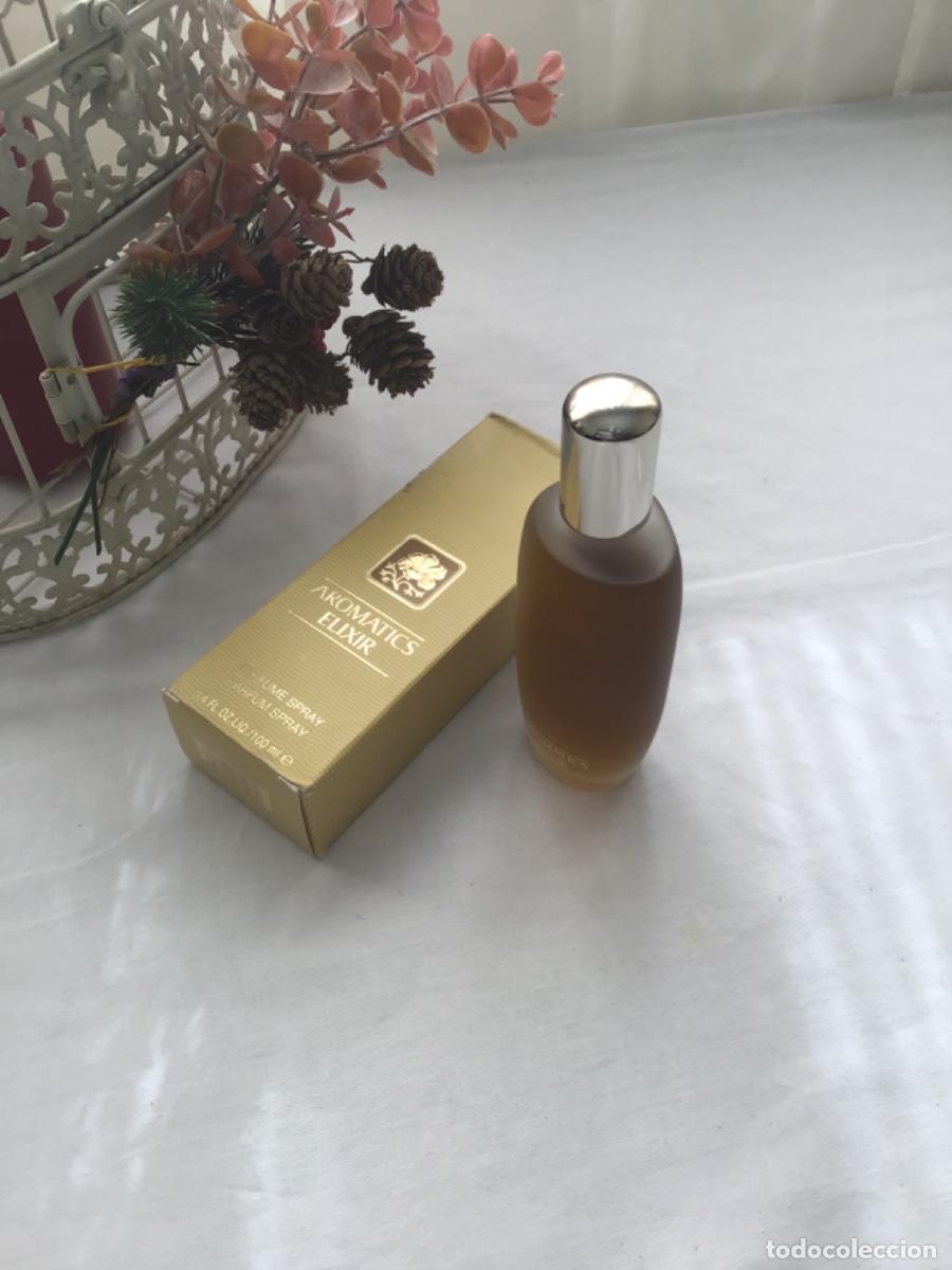 Miniaturas de perfumes antiguos: Aromatics Elixir Eau de parfum Clinique 100 ml - Foto 12
