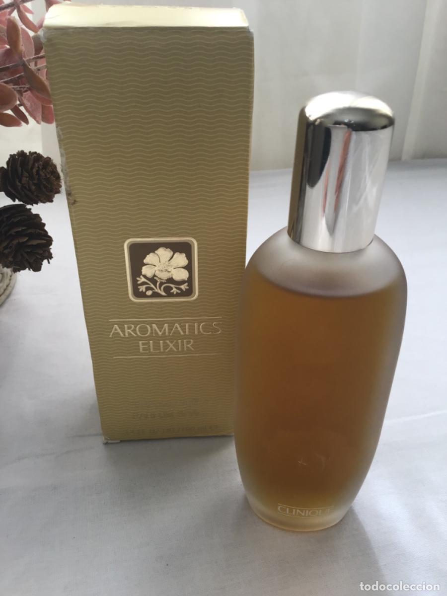 Miniaturas de perfumes antiguos: Aromatics Elixir Eau de parfum Clinique 100 ml - Foto 13