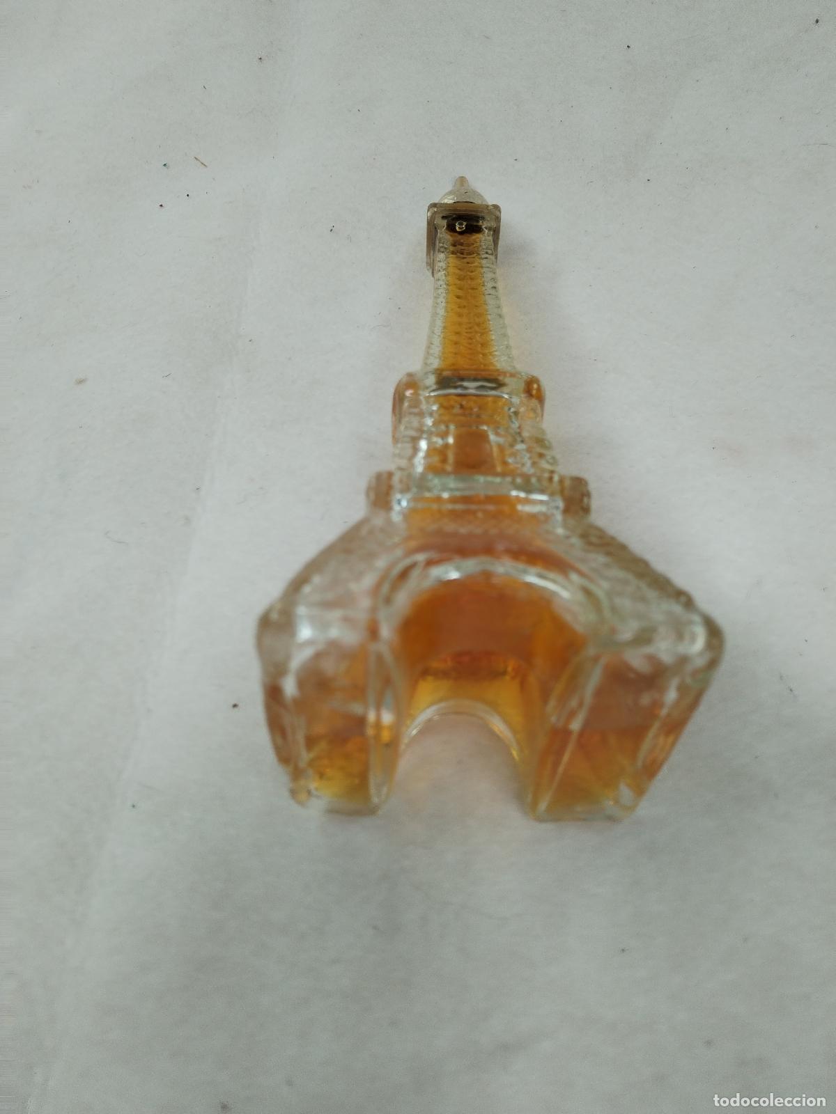 Miniaturas de perfumes antiguos: colonia avon botella torre eiffel - Foto 2