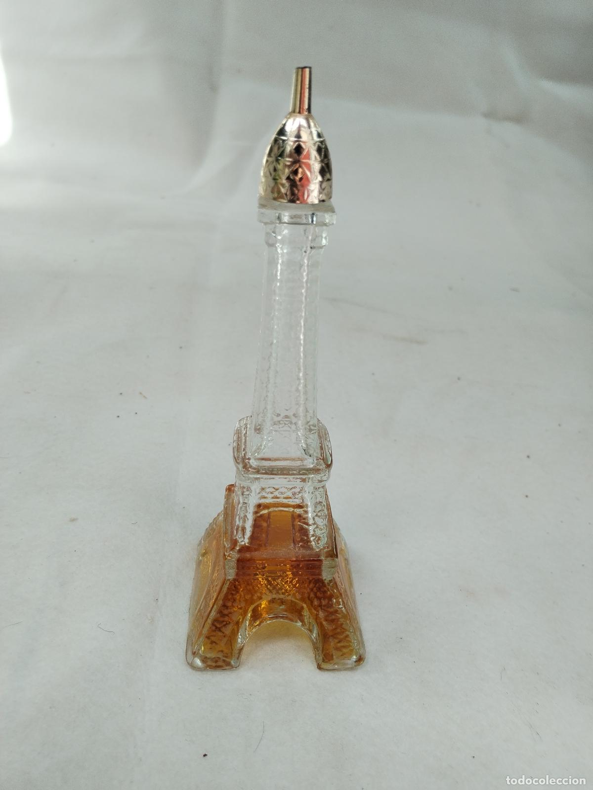 Miniaturas de perfumes antiguos: colonia avon botella torre eiffel - Foto 3