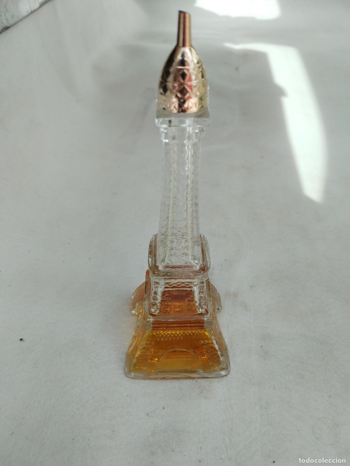 Miniaturas de perfumes antiguos: colonia avon botella torre eiffel - Foto 6