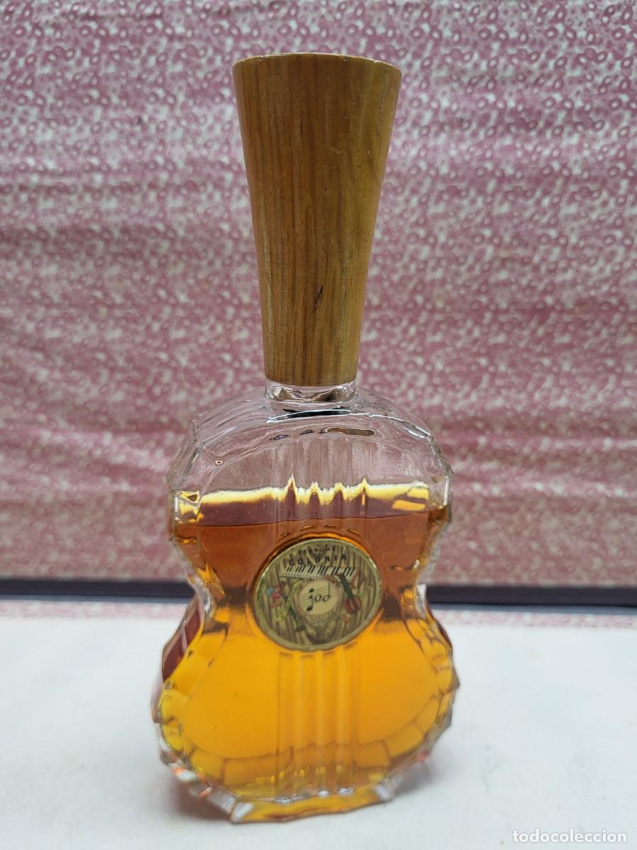 Miniaturas de perfumes antiguos: ANTIGUA BOTELLA COLONIA PERFUME JOD COPER FORMA DE GUITARRA