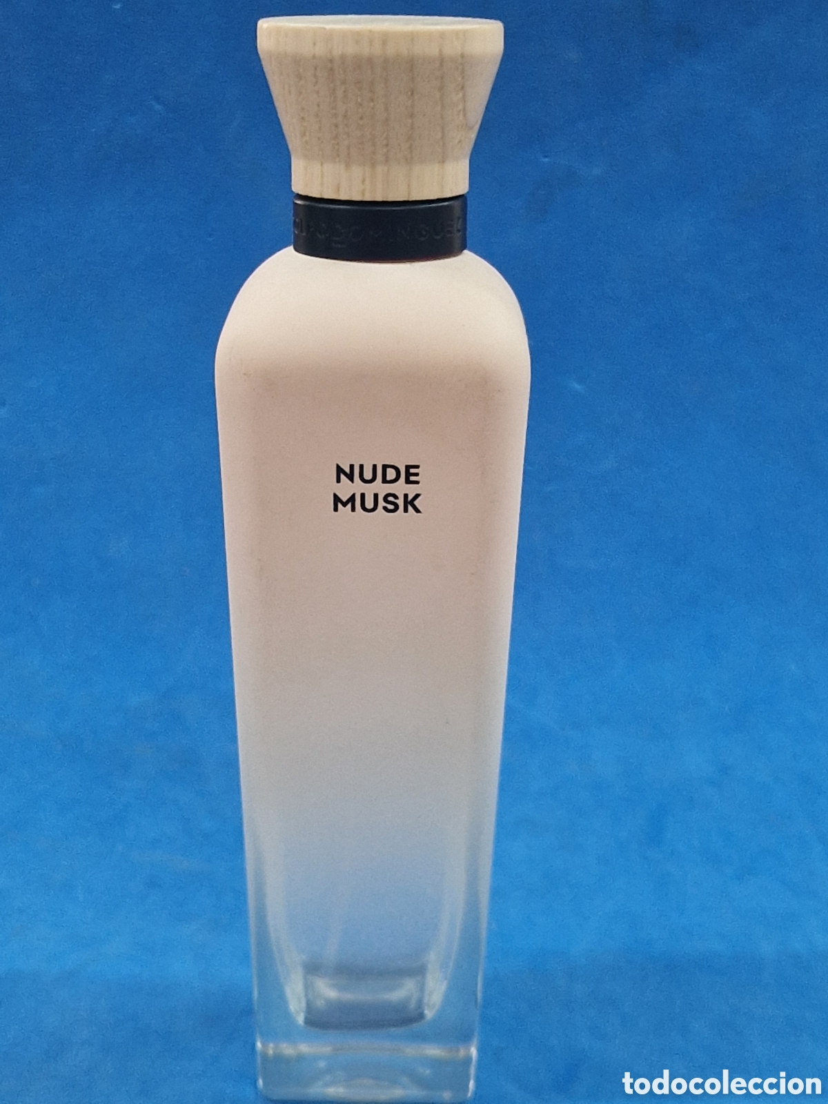 Miniaturas de perfumes antiguos: Nude , Adolfo Dom&iacute;nguez, botella vac&iacute;a