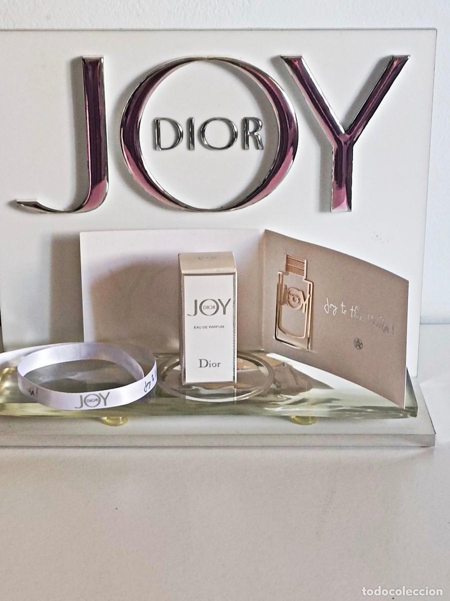 Miniaturas de perfumes antigos: Lote Dior JOY miniatura Eau de Parfum, marcap&aacute;ginas y cinta para perfumar