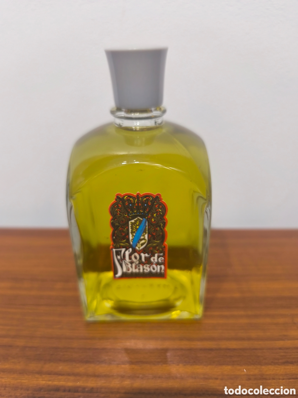 Miniaturas de perfumes antiguos: Botella colonia flor de blas&oacute;n mirurgia
