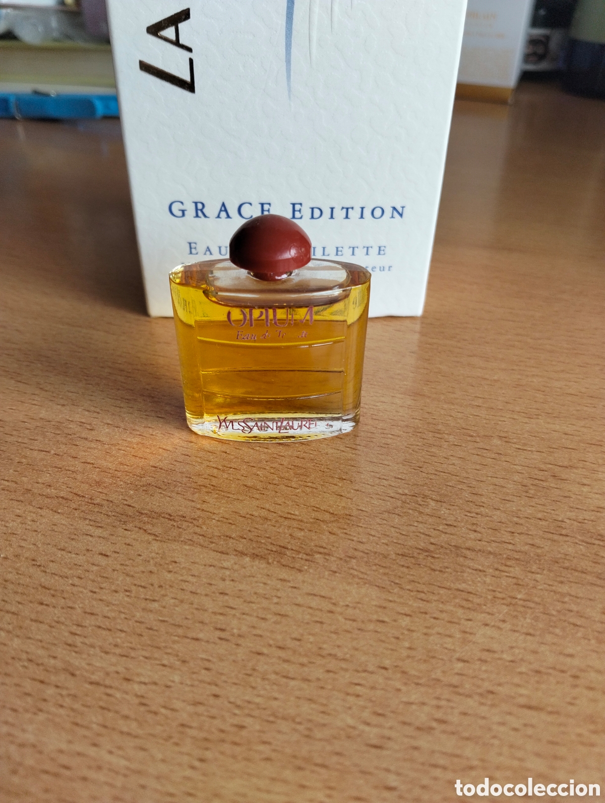 Miniaturas de perfumes antiguos: Opium Yves Saint Laurent 7,5 ml