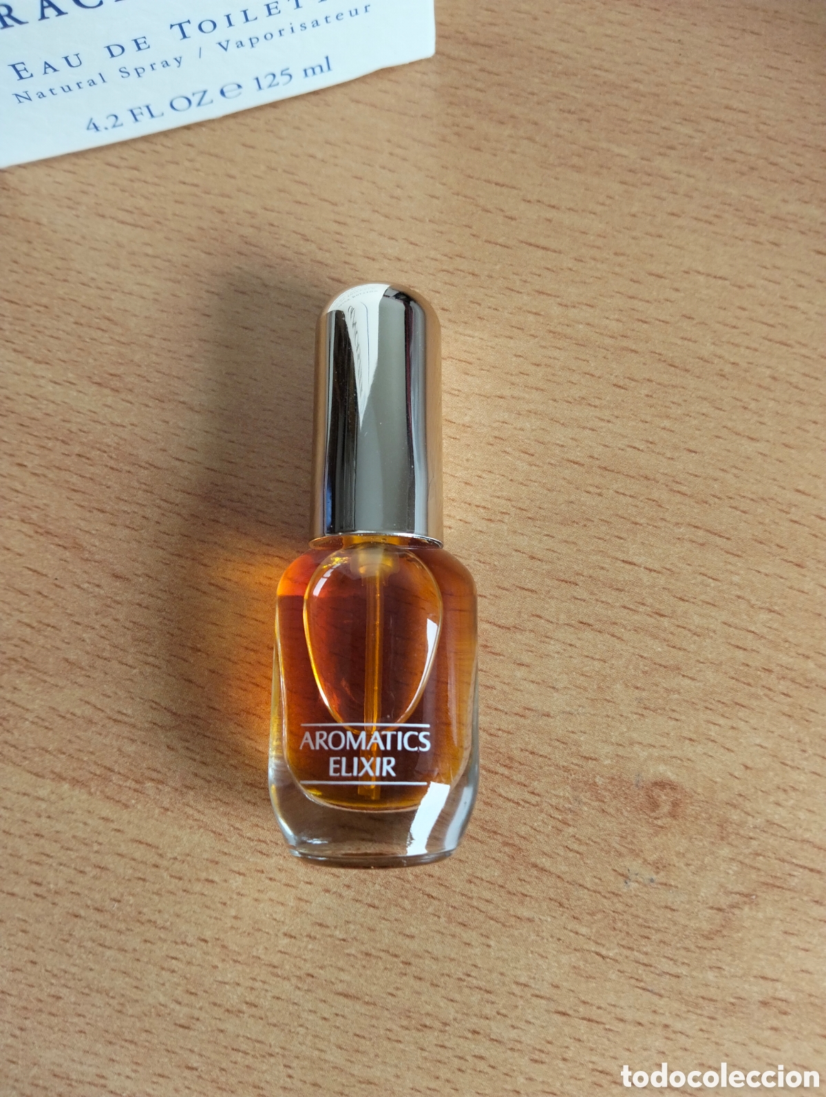 Miniaturas de perfumes antiguos: Aromatic elixir de clinique - Foto 2