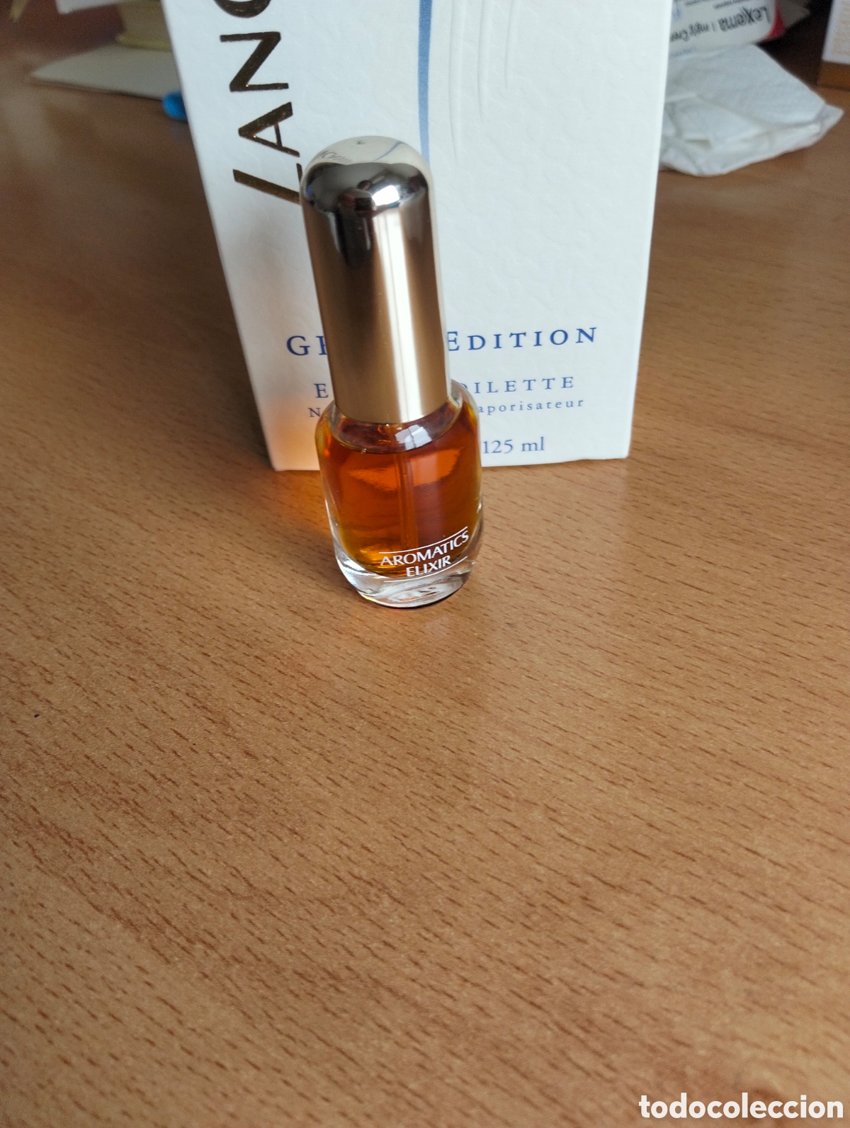 Miniaturas de perfumes antiguos: Aromatic elixir de clinique