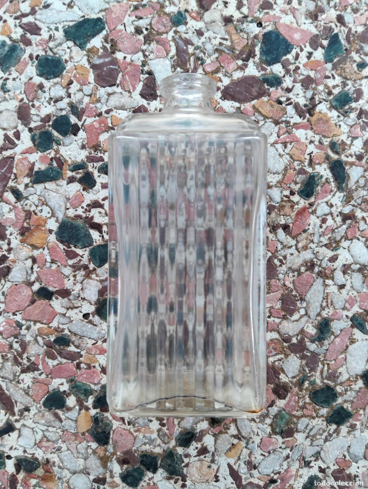 Miniaturas de perfumes antiguos: Antiguo bote frasco de perfume colonia de cristal transparente a rallas madame rochas