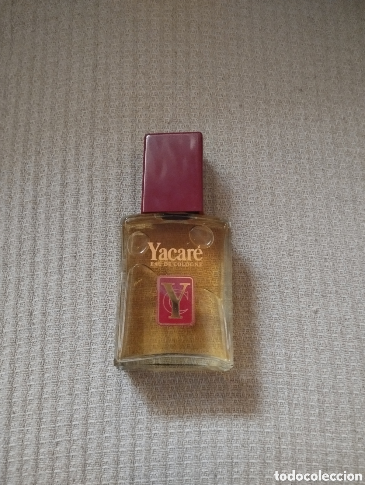 Miniaturas de perfumes antiguos: ANTIGUA BOTELLA DE COLONIA YACAR&Eacute; 50ML