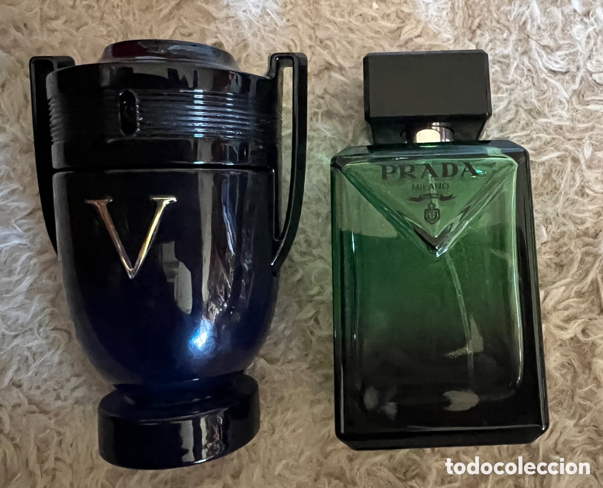 Miniaturas de perfumes antiguos: Lote 2 frascos de perfume vac&iacute;os originales Rabanne Invictus y Prada