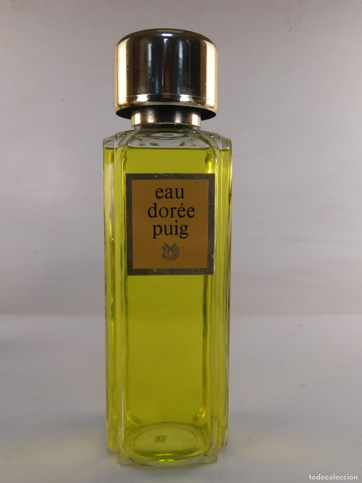Miniaturas de perfumes antiguos: BOTELLA GRANDE DE EAU DOREE PUIG