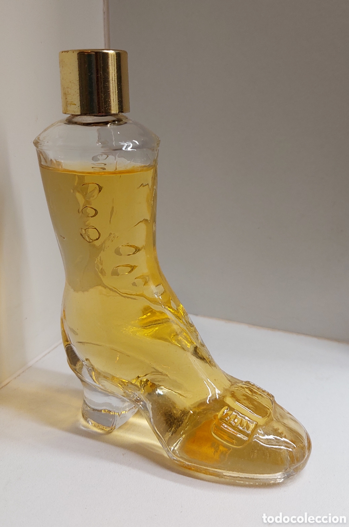 Miniaturas de perfumes antiguos: Botella colonia de cristal con forma de Bota - Zapato Avon