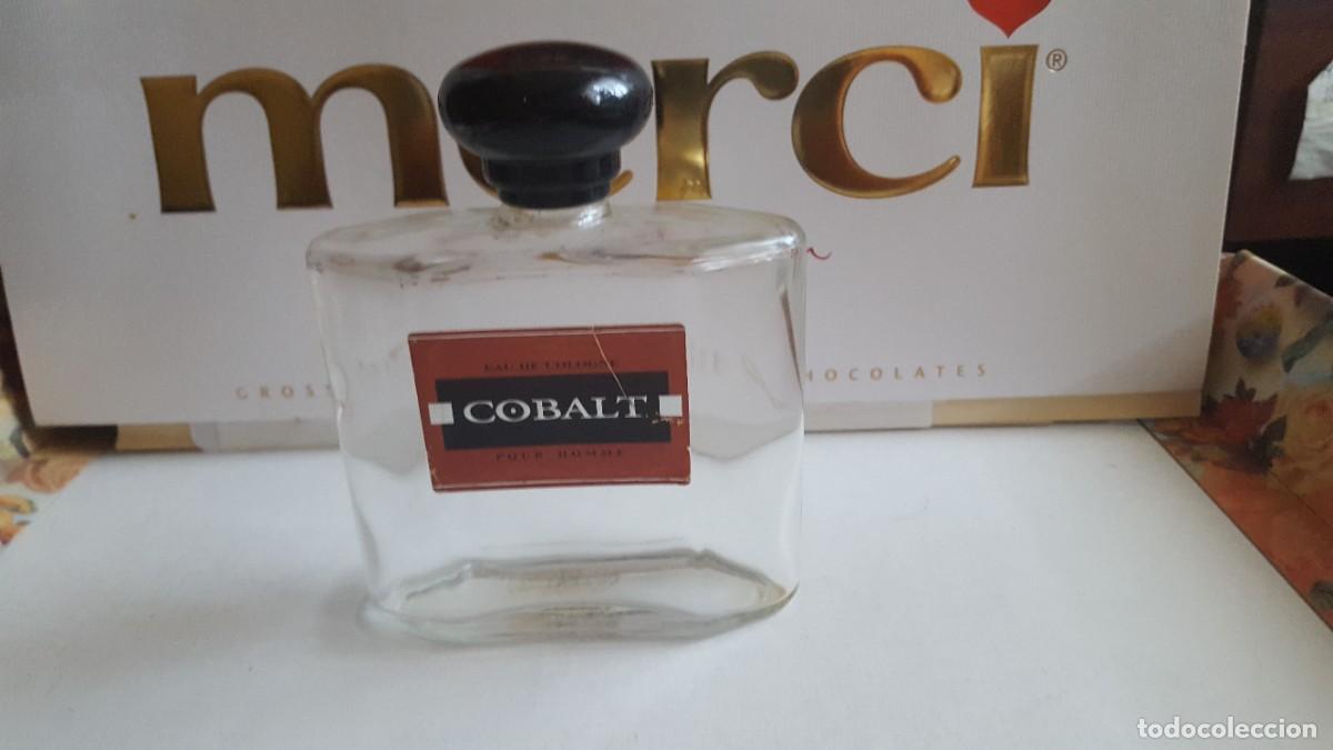 Miniaturas de perfumes antiguos: Frasco/bote Eau de toilette/colonia/perfume. Cobalt. 200 ml. Vac&iacute;a.