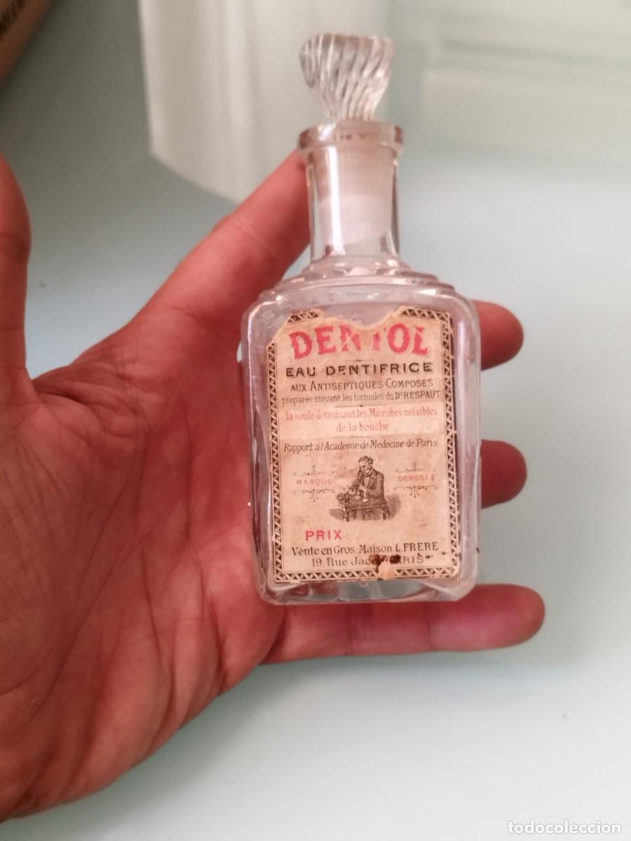 Miniaturas de perfumes antiguos: Frasco de vidrio antiguo de agua dent&iacute;frica &laquo;Dentol&raquo; de finales del siglo XIX o principios del XX.