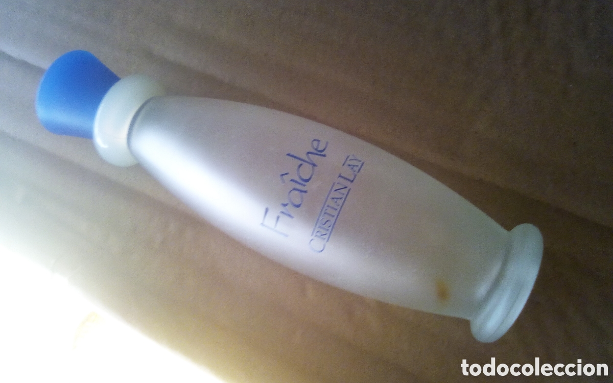 Miniaturas de perfumes antiguos: Frasco vac&iacute;o de perfume. Fraiche. Eau de toilette. Cristian Lay. 85 ml., mide 16,5 cm.