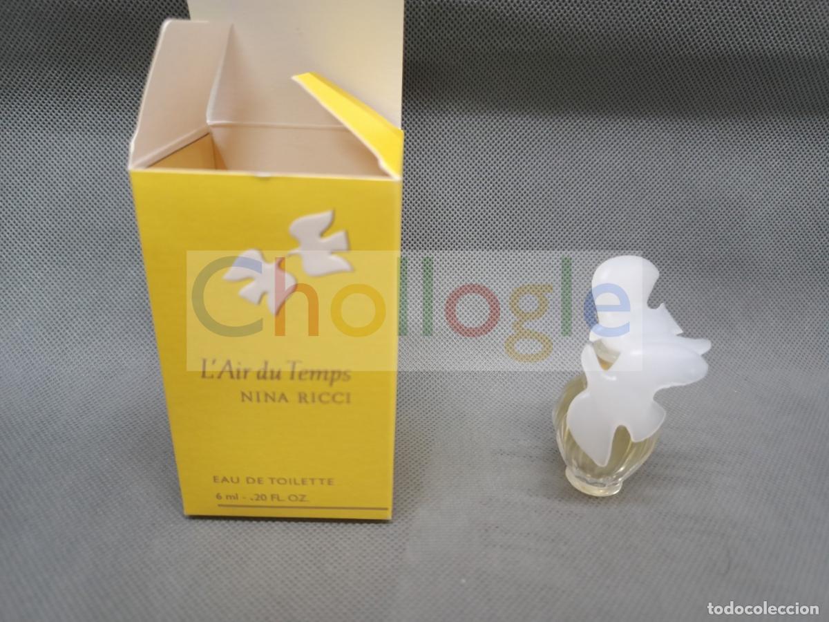 Miniaturas de perfumes antiguos: Nina Ricci L'Air du Temps miniatura perfume con caja amarilla