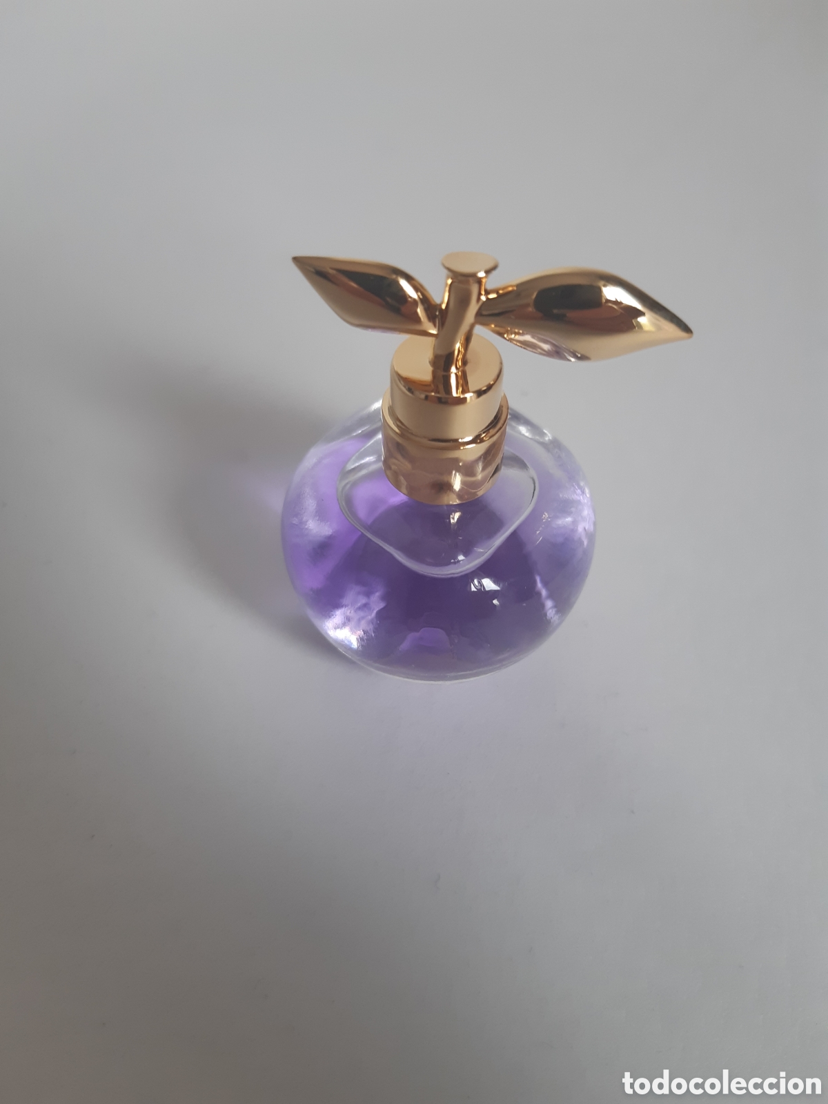 Miniatures of antique perfumes: Miniatura de perfume Luna Blosson. Nina Ricci