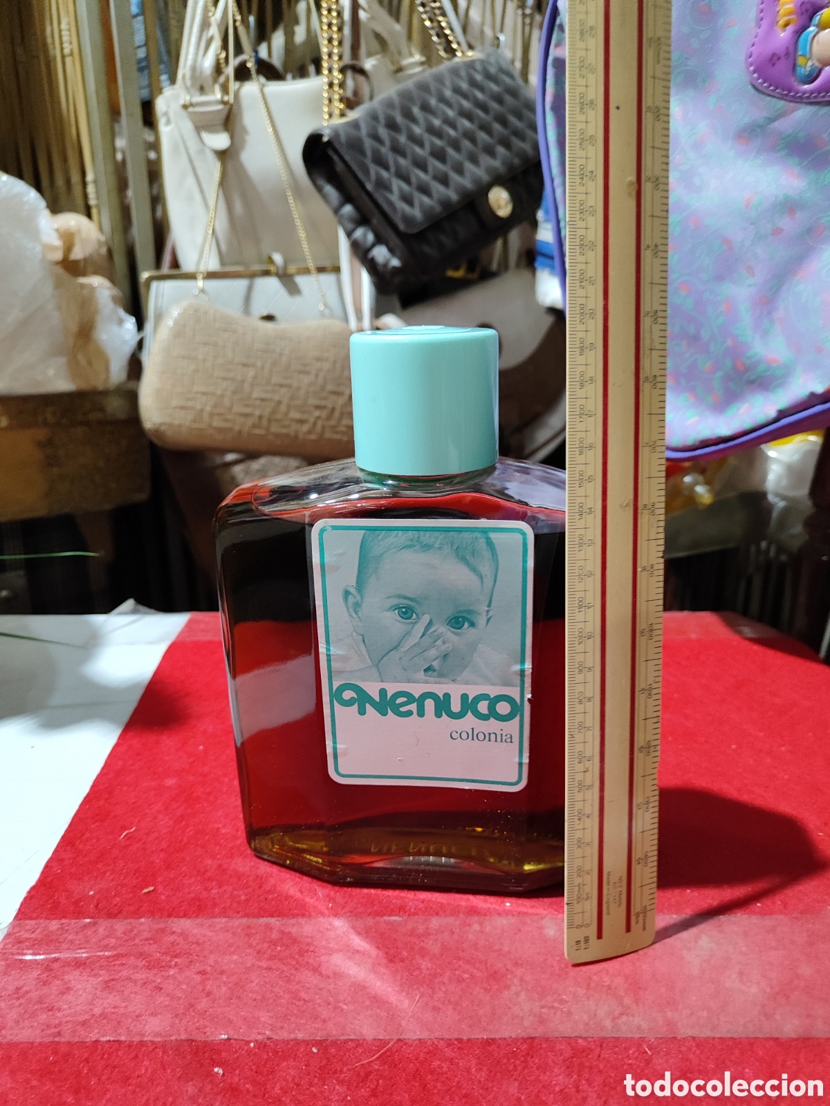 Miniaturas de perfumes antiguos: Gran botella de colonia NENUCO completa leer descripci&oacute;n