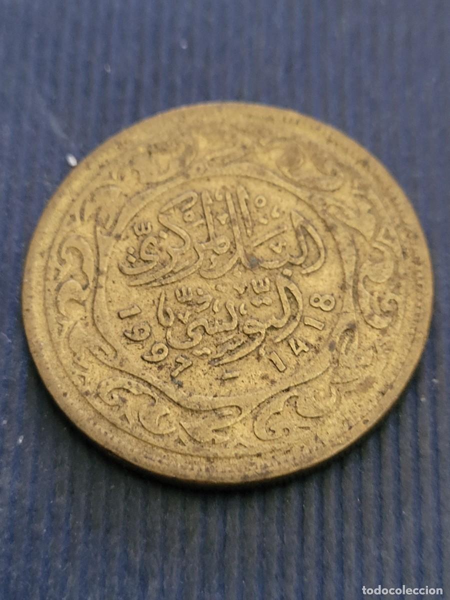 Monedas antiguas de &Aacute;frica: Moneda 100 millimes 1997 T&uacute;nez - Foto 1