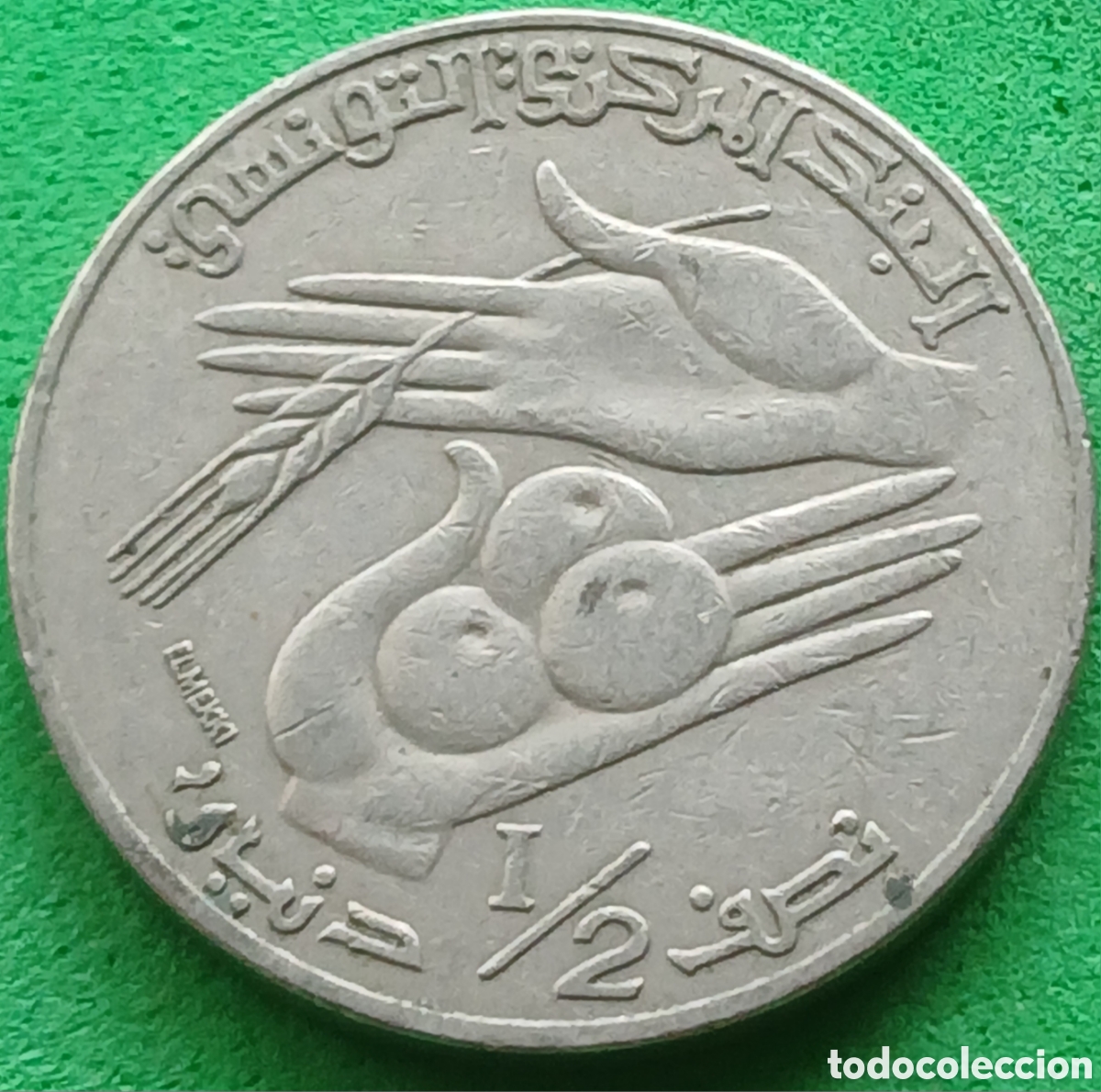 Monedas antiguas de &Aacute;frica: T&uacute;nez &frac12; dinar 1988 km#318
