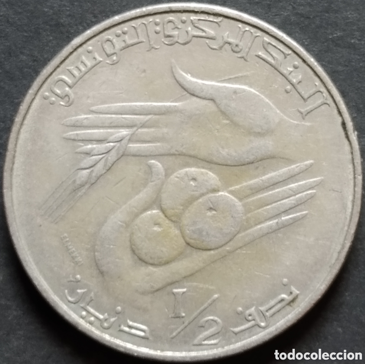 Monedas antiguas de &Aacute;frica: MONEDA - T&Uacute;NEZ &frac12; DINAR 1983