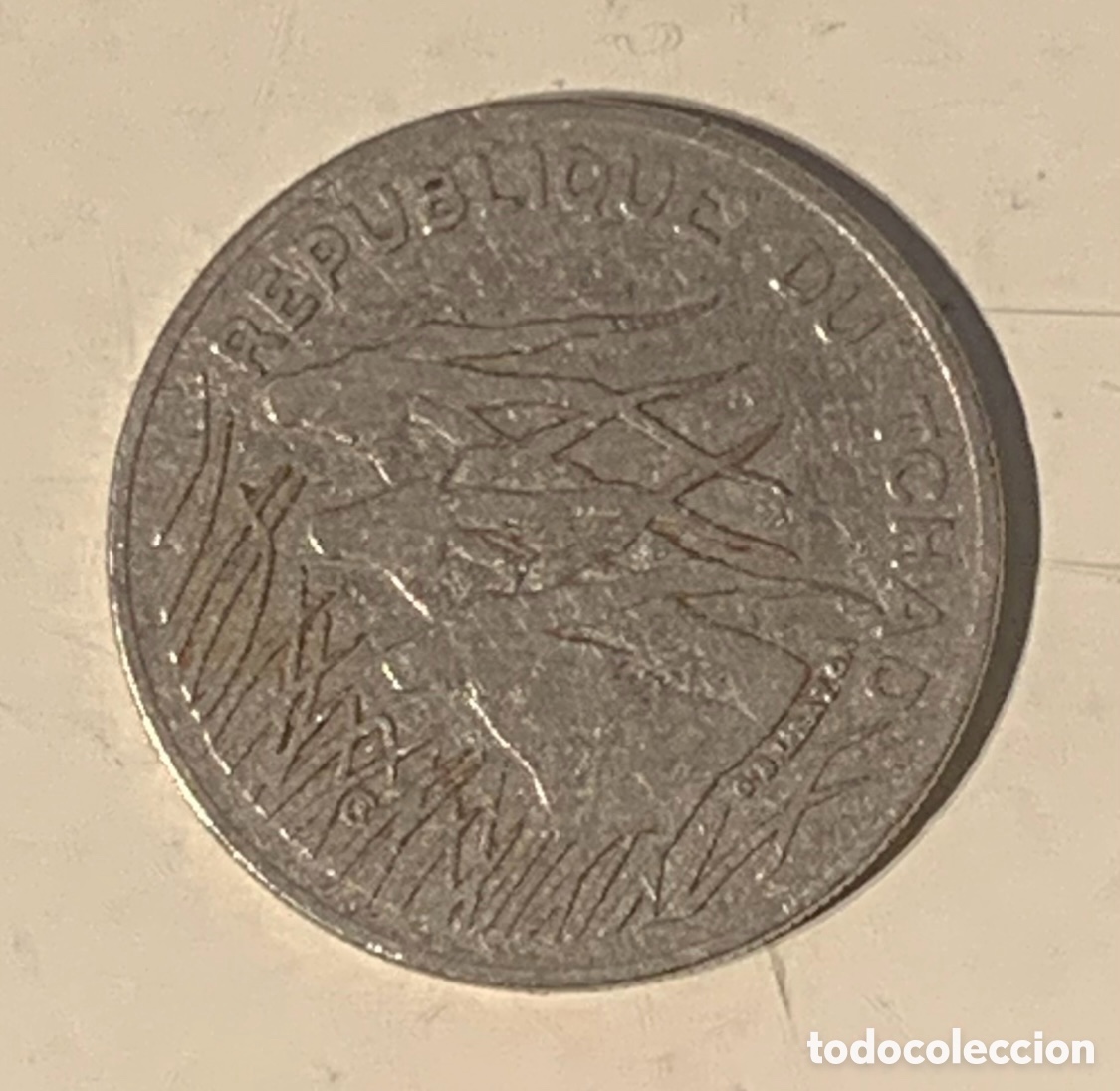Monedas antiguas de &Aacute;frica: Moneda. Banque C&eacute;ntrale. Republique du TCHAD. GBL. BAZOR. 100 Francs. 1985.