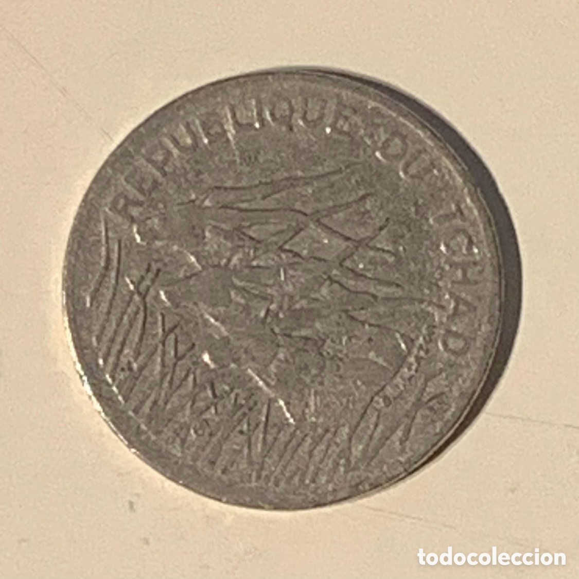 Monedas antiguas de &Aacute;frica: Moneda. Banque C&eacute;ntrale. Republique du TCHAD. GBL. BAZOR. 100 Francs. 1988.