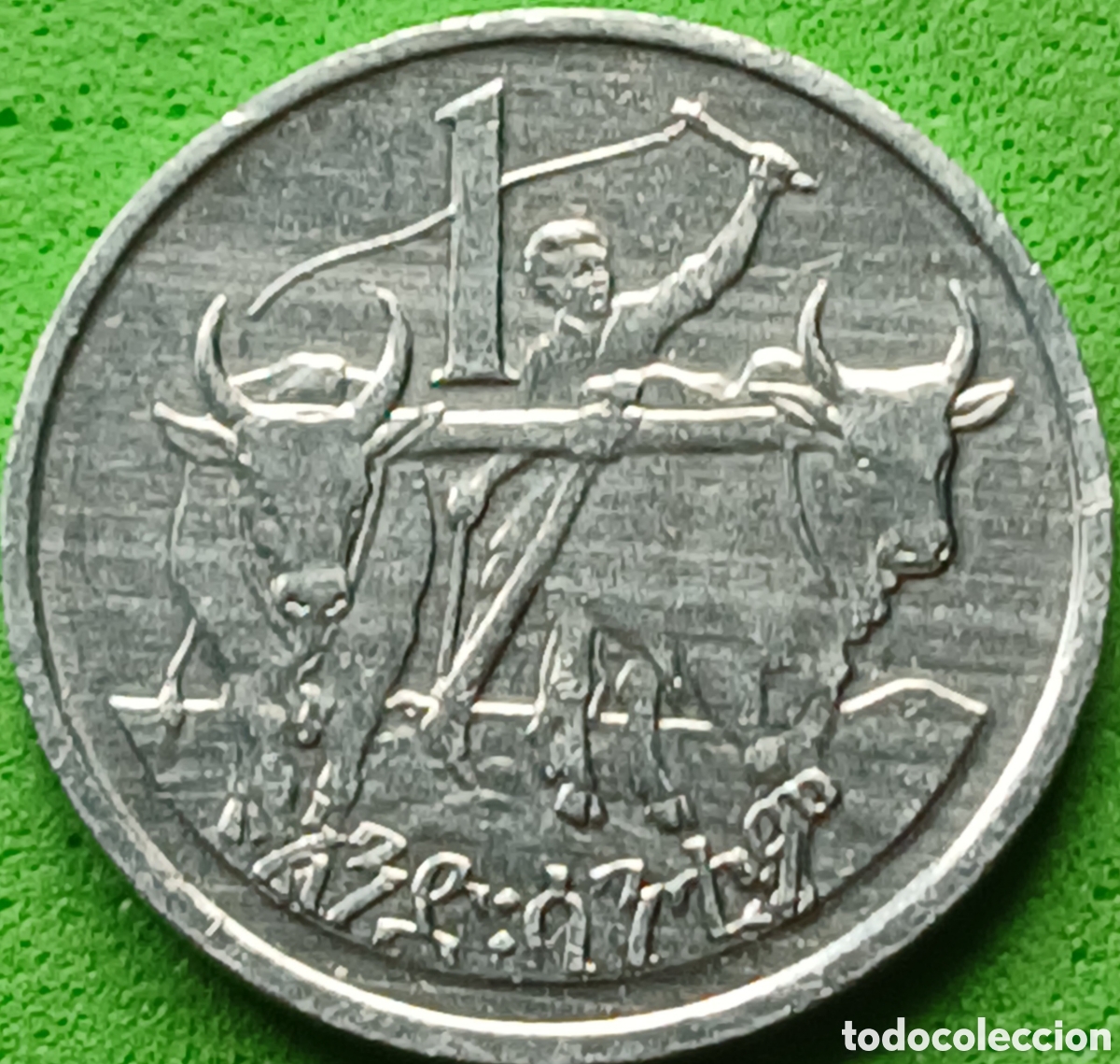 Monedas antiguas de &Aacute;frica: Etiop&iacute;a 1 santeem 1977 km#43 sin marca &rdquo;FM&rdquo; ,bigotes uniformes en la barbilla/ ESCASA!!